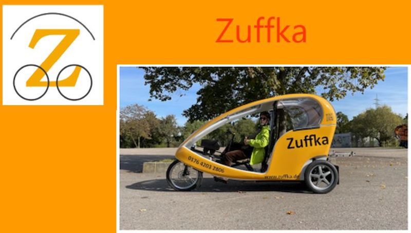 Das Bild Zeit das Logo der Zuffka sowie einem Bild mit dem neuen Fahrgerät, spaceig gelb